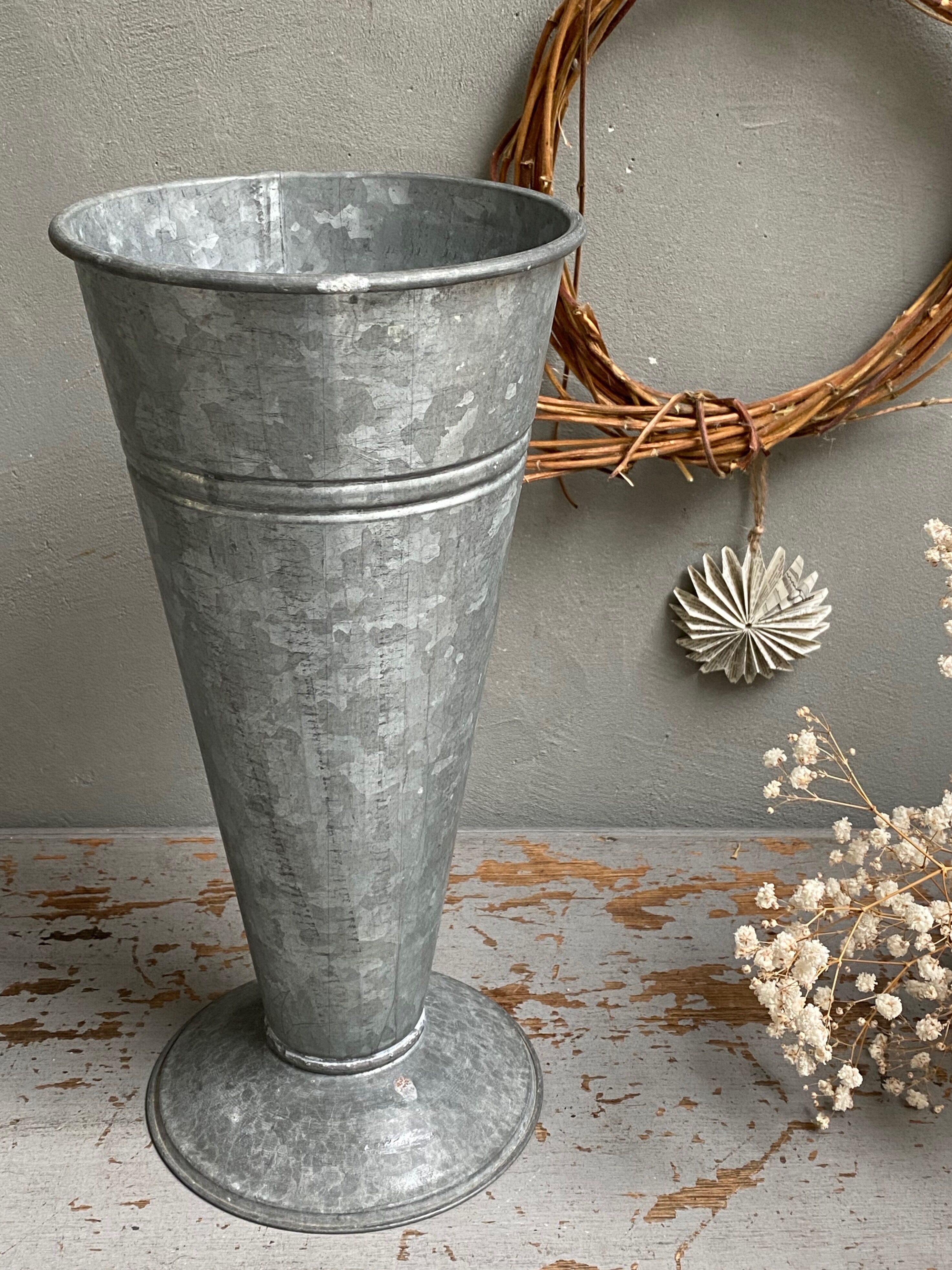 Old zinc florist's vase