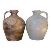 Duo of brown and cream ceramic jugs