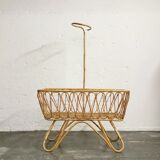 Baby cradle in vintage rattan