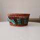 Vintage wicker and rattan basket with tartan fabric.