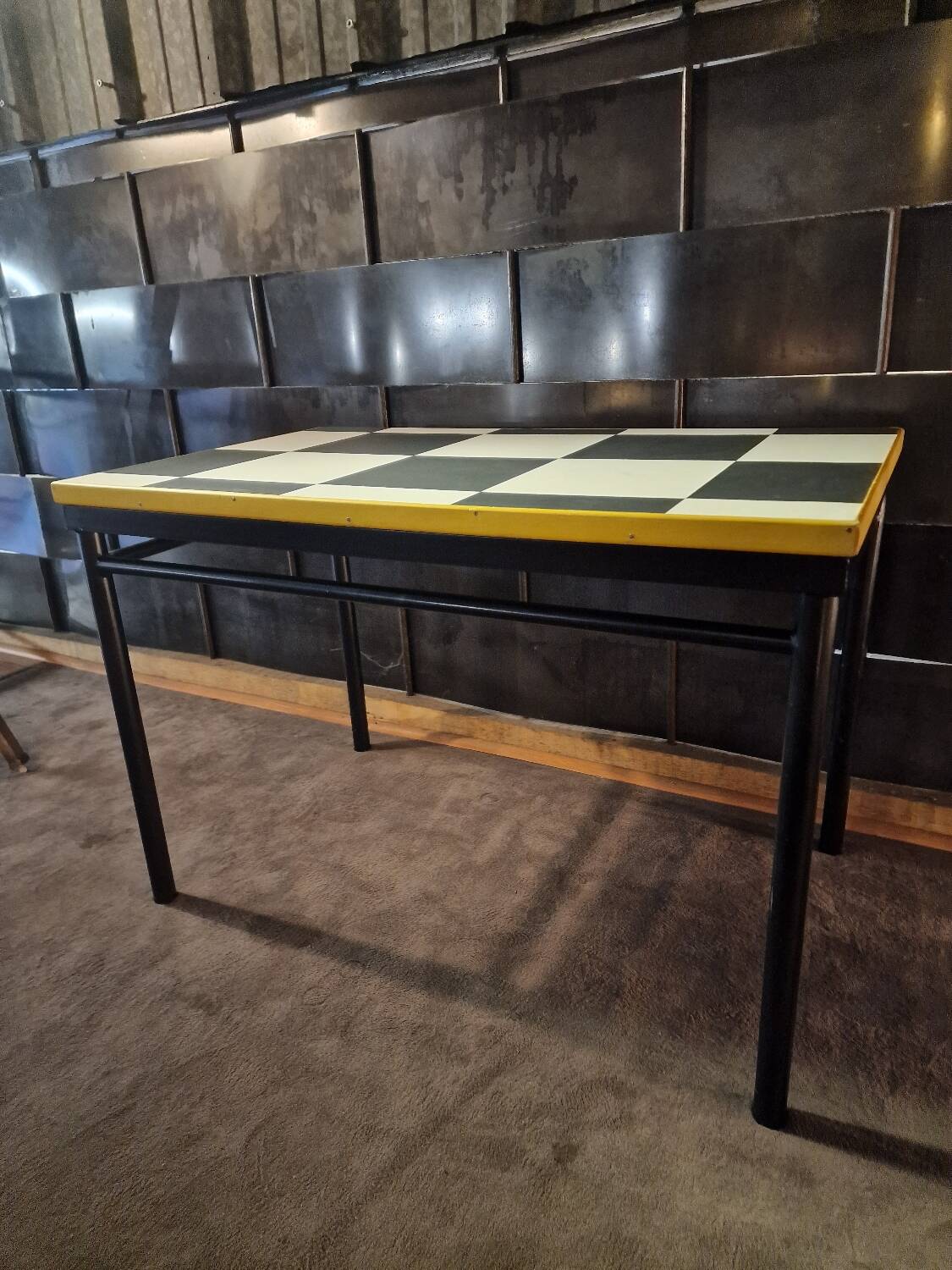 Table design in the style of Le Corbusier.