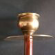 Two vintage wooden and brass candlesticks.