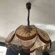 Scandinavian style glass and wood pendant light.