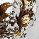 Chandelier with tassels and golden brass