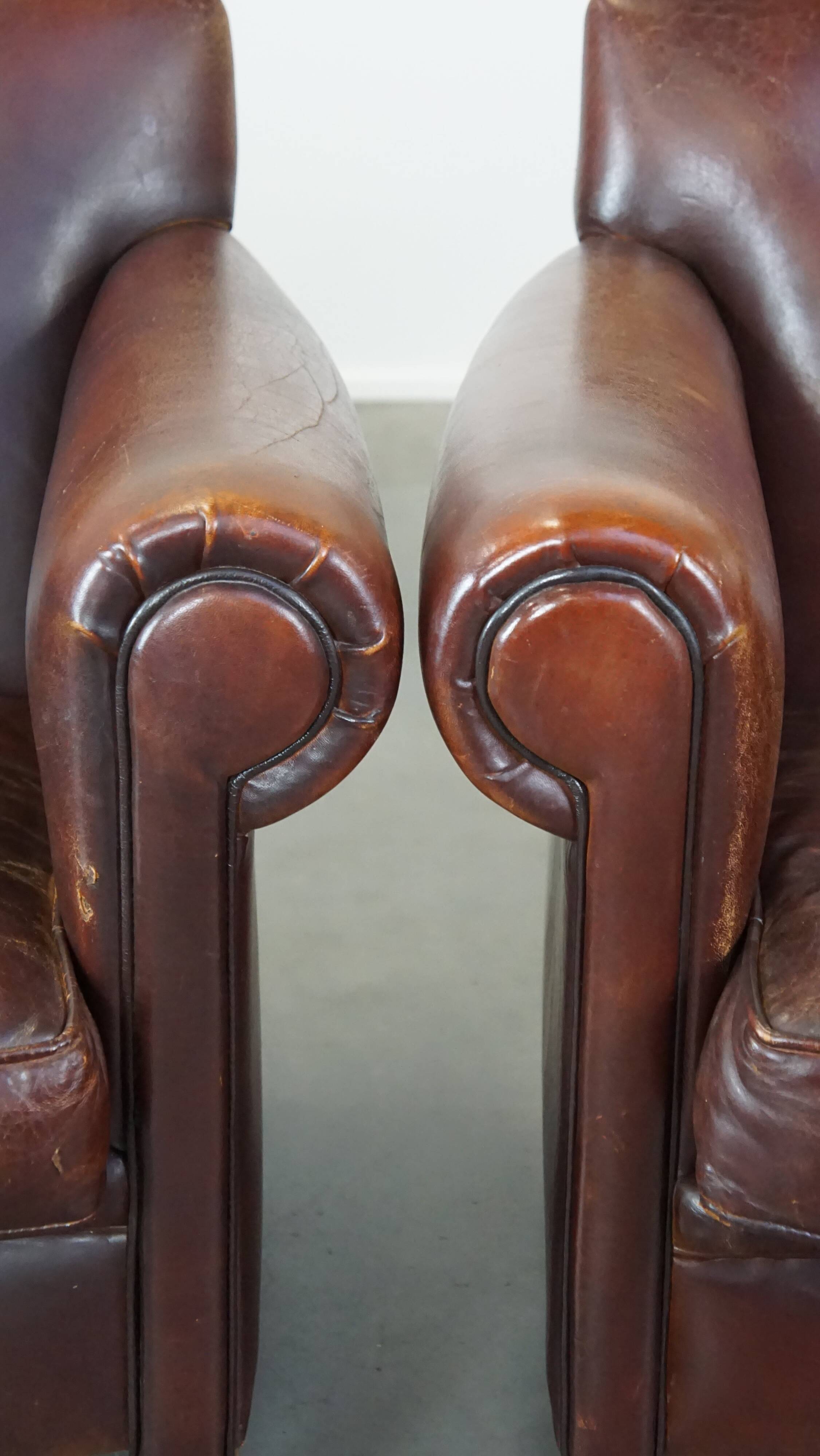 Set of 2 design armchairs made of sheepskin