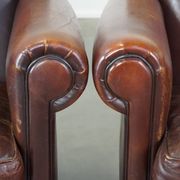 Set of 2 design armchairs made of sheepskin