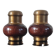 Vintage salt and pepper shaker duo in brass and turned wood.