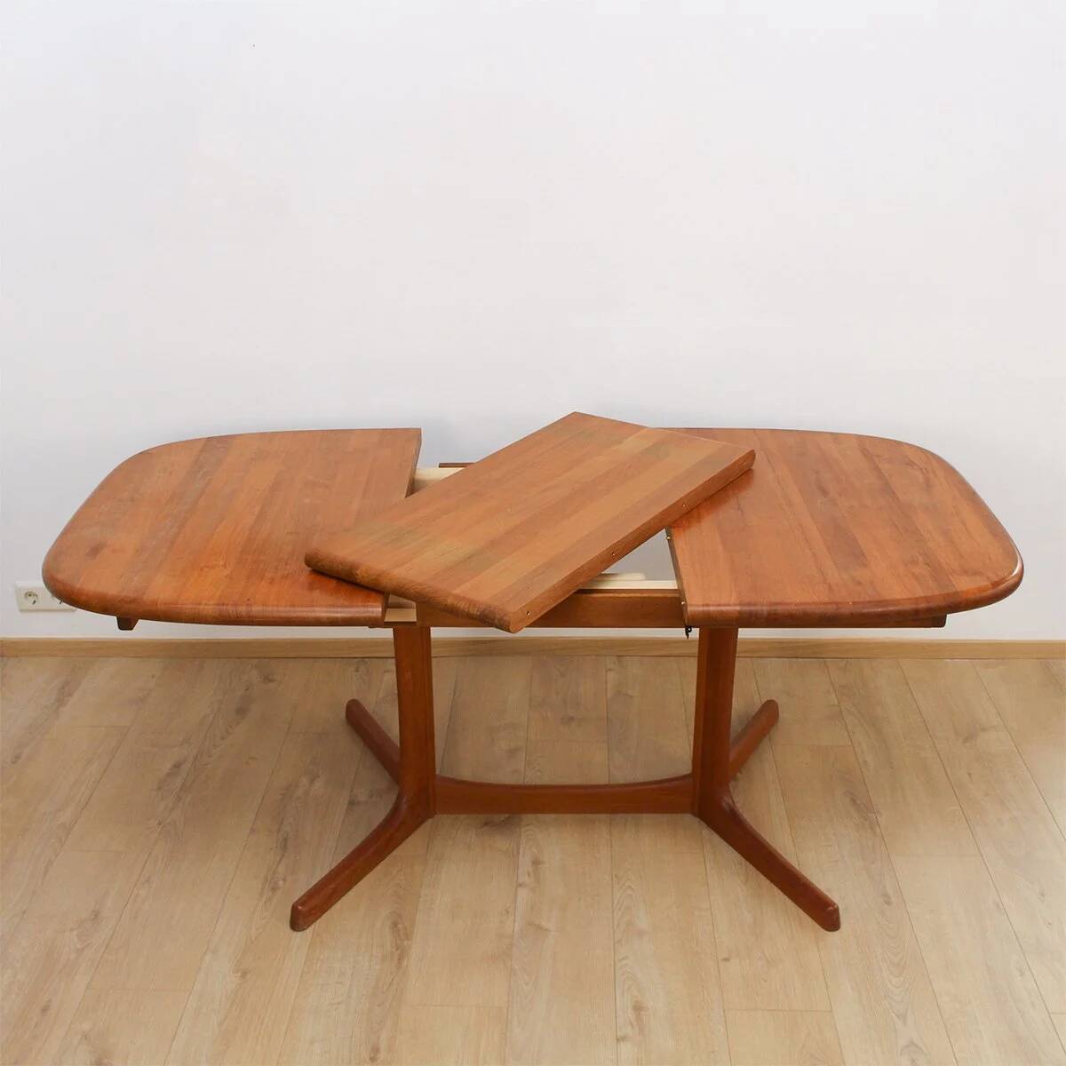 Teak dining table by Dyrlund