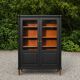 Renovated black antique Louis XVI style display cabinet, glass-fronted bookcase.