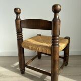 Vintage low chair in the style of Charles Dudouyt – Wooden fireside chair