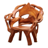 Robust armchair made of recycled wood