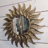 sun mirror with angel wings in golden patinated stucco