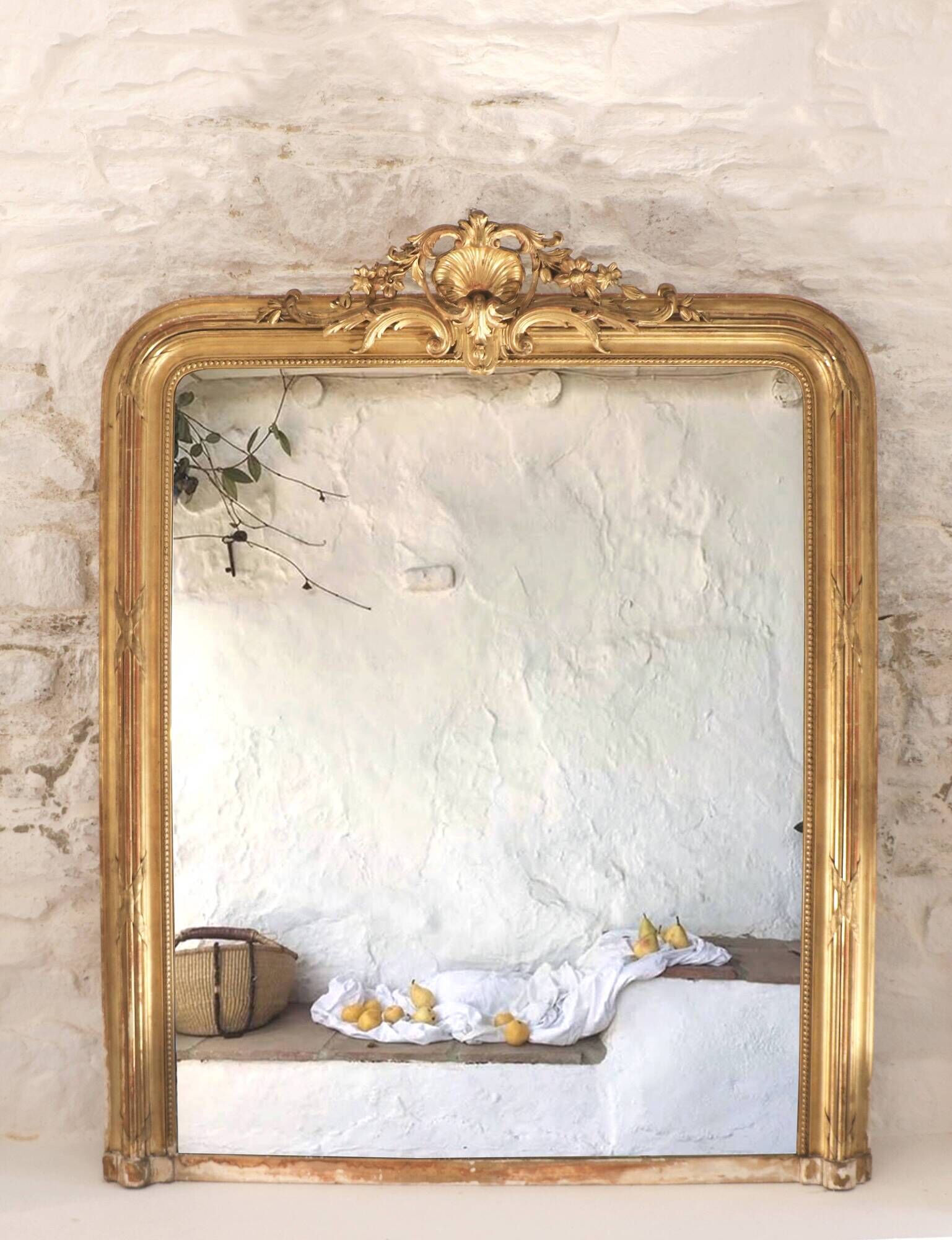 Manor house trumeau mirror in gilded wood, 19th century