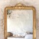 Manor house trumeau mirror in gilded wood, 19th century