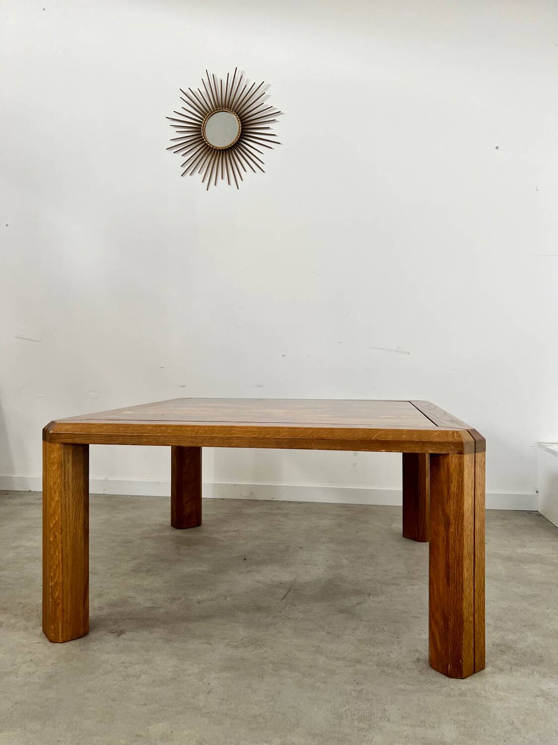 Old coffee table with golden marble top, 70s design, vintage wooden feet
