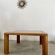 Old coffee table with golden marble top, 70s design, vintage wooden feet