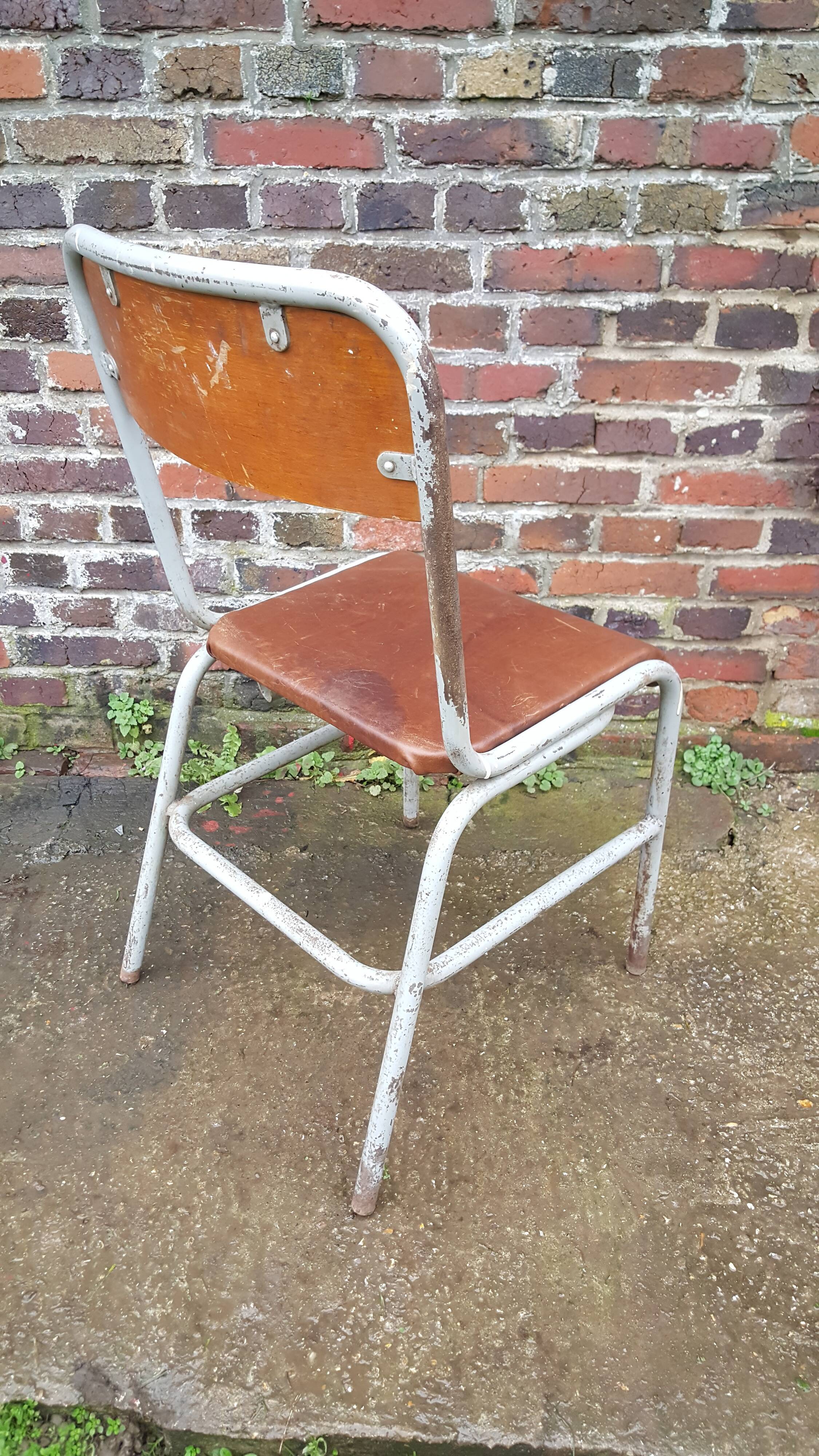 Vintage chair dated 1955 leather seat