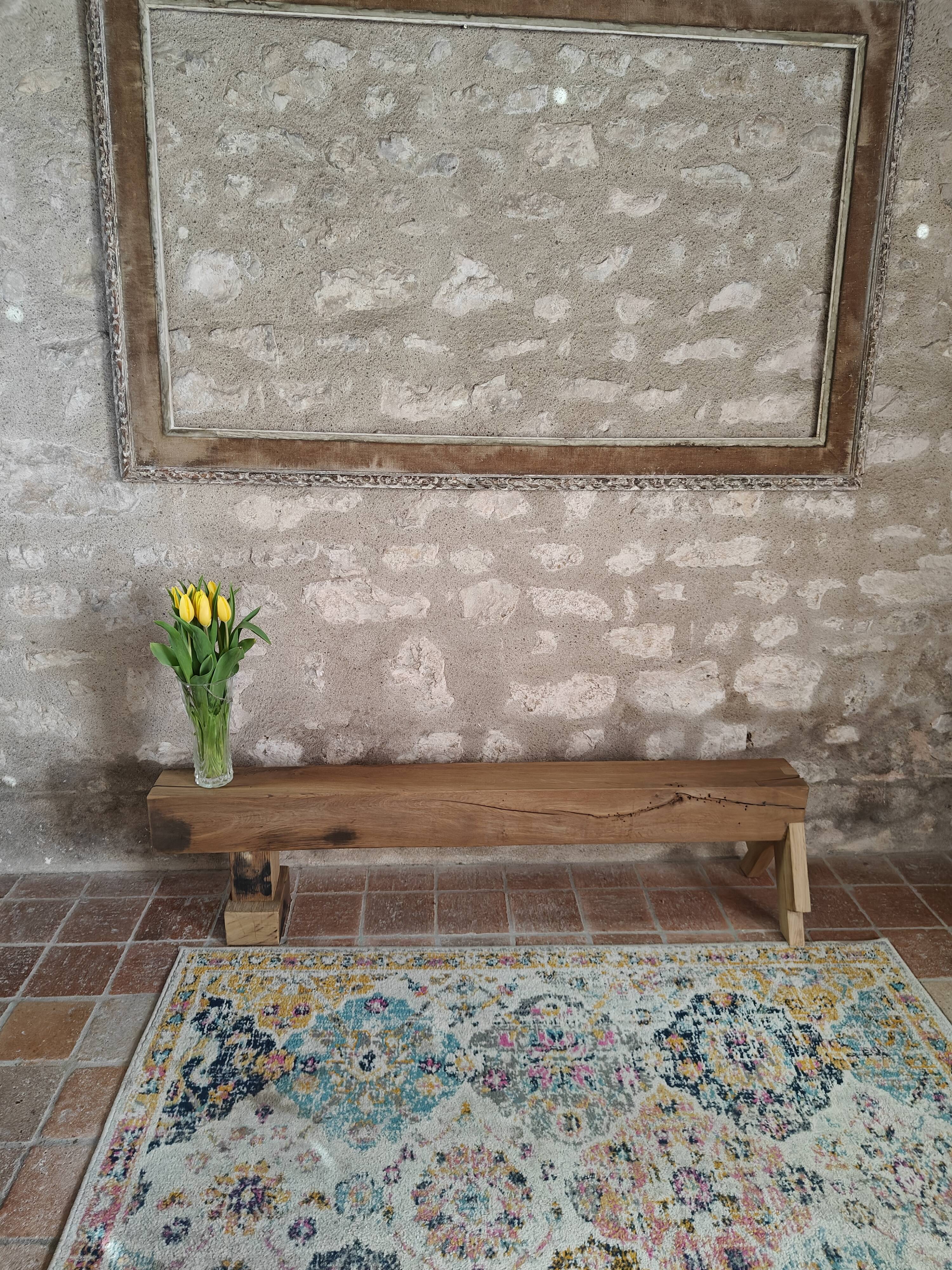 Solid oak bench with asymmetrical legs