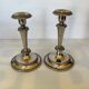 Pair of silver-plated zinc metal candlesticks
