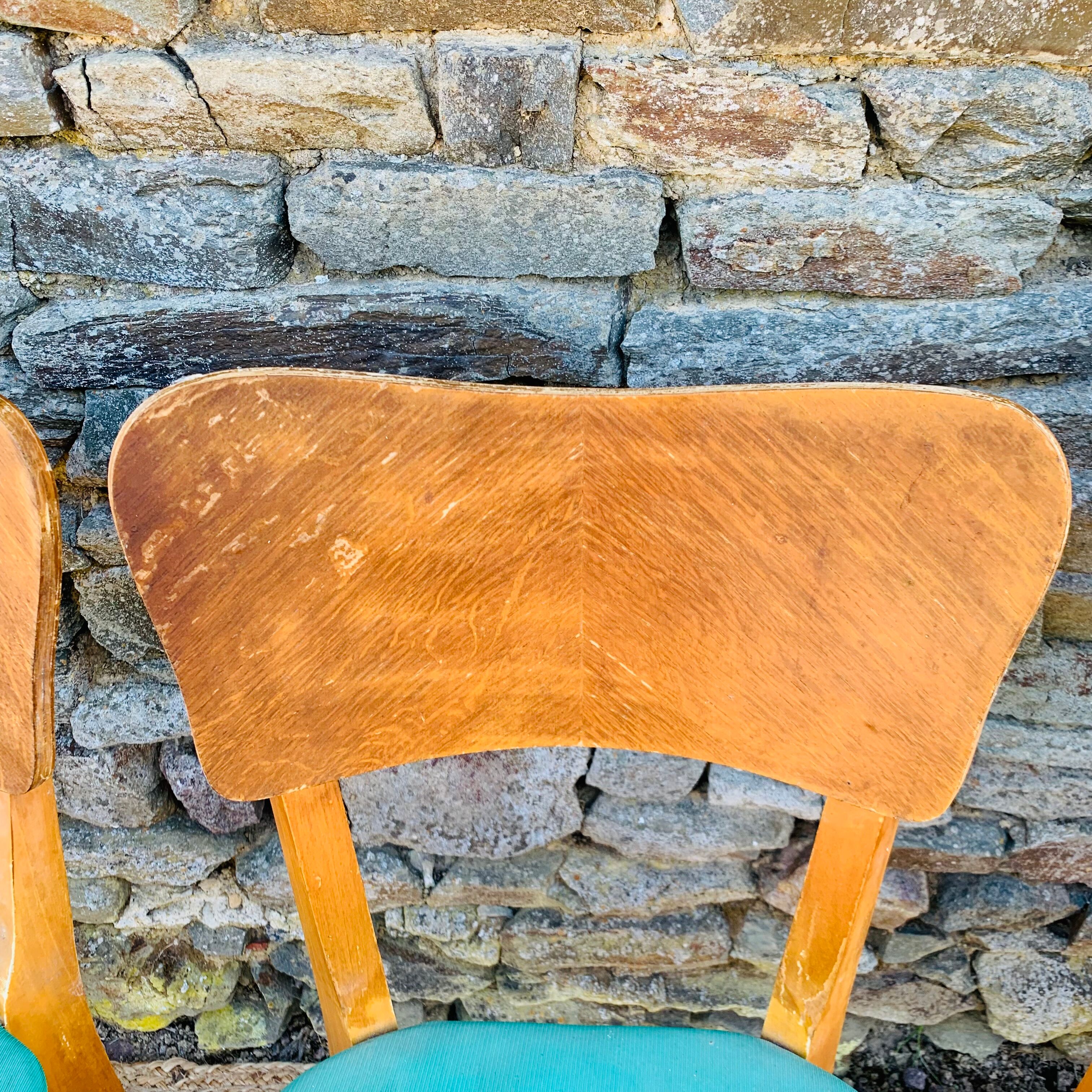 Set of 4 vinyl and wood chairs