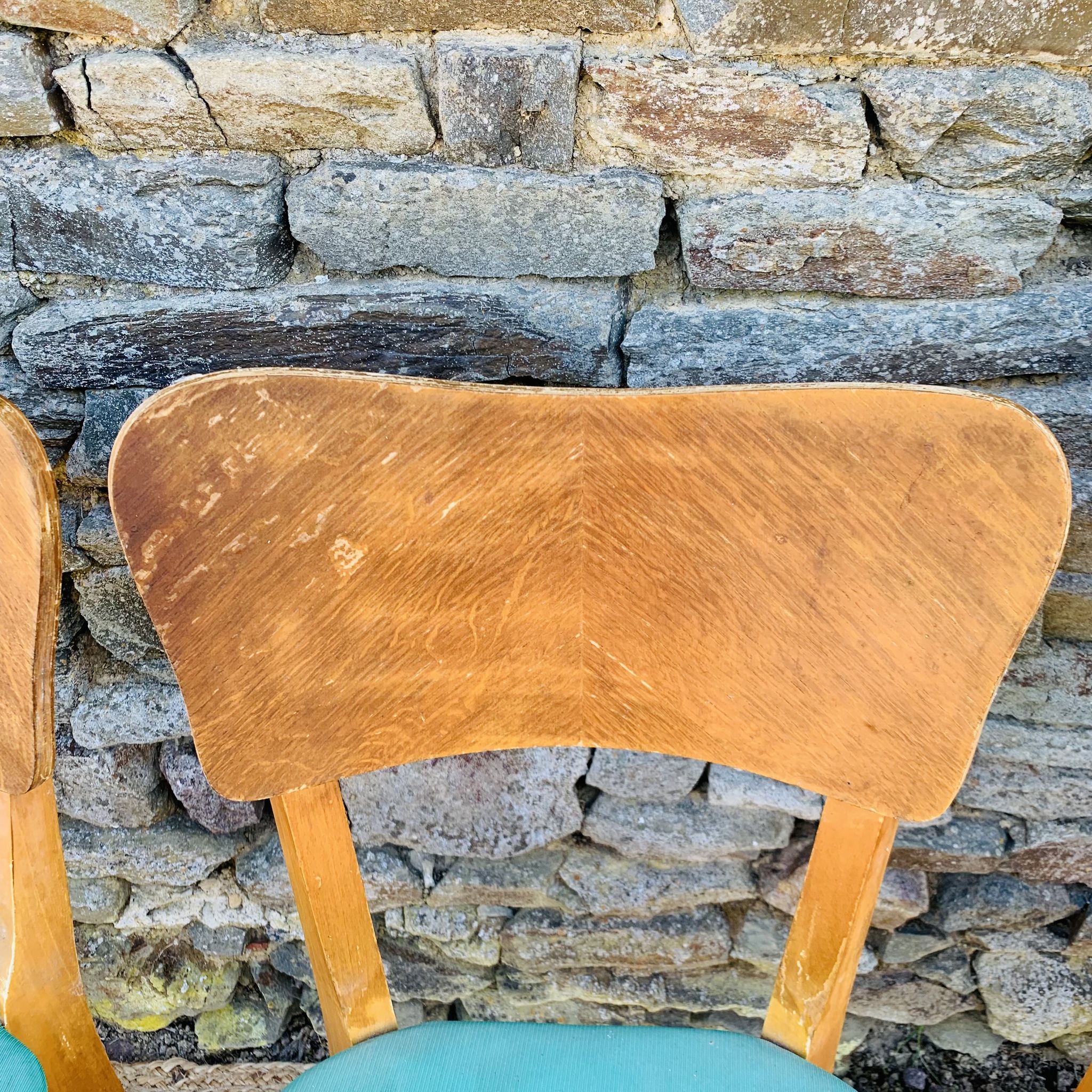 Set of 4 vinyl and wood chairs