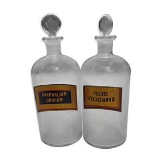 Pair of Transparent Glass Pharmacy Bottles