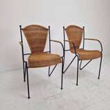 Pair of wicker and iron armchairs by Frederic Weinberg, United States, 1950s.
