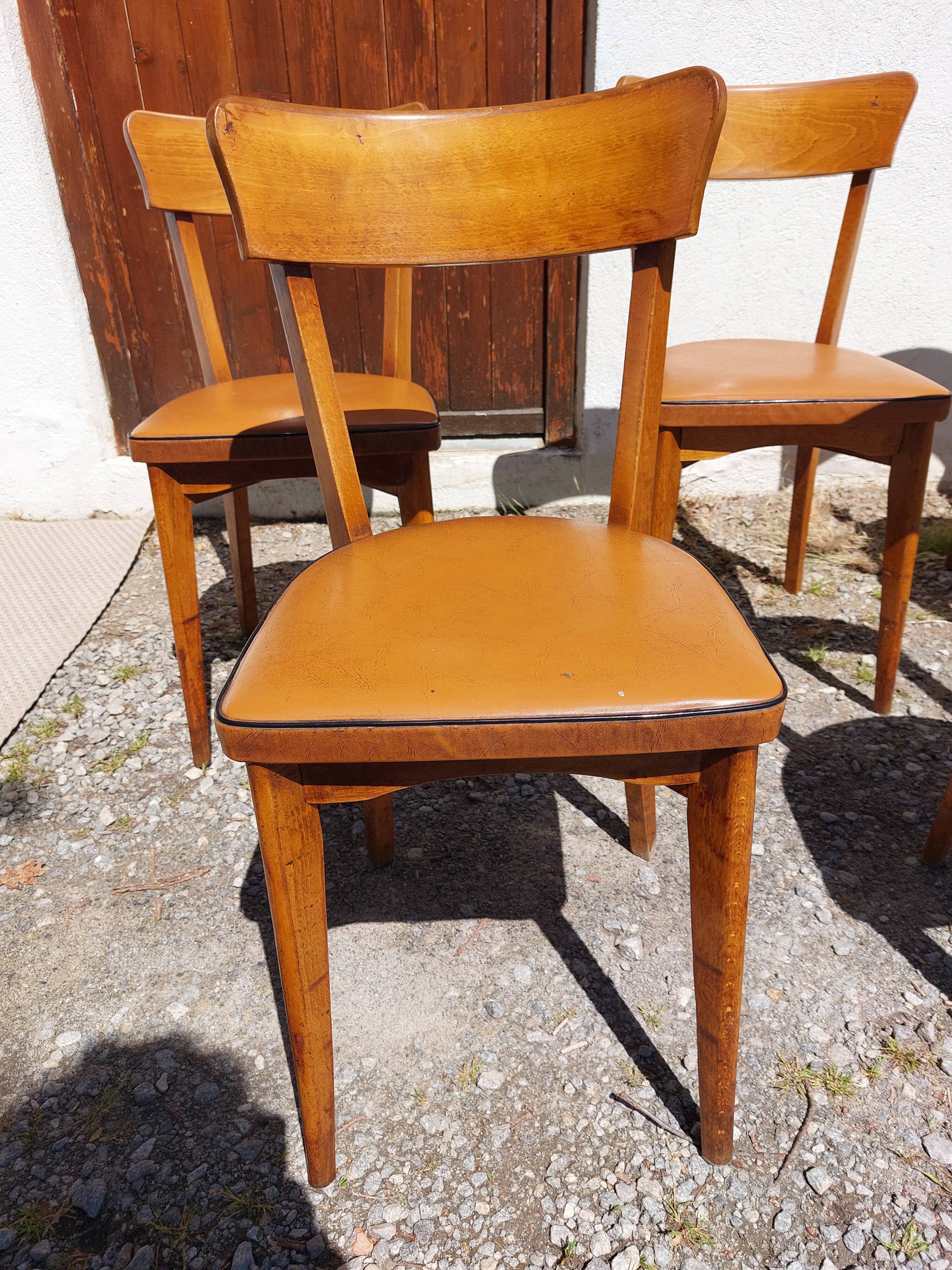 6 vintage 1960s wooden bistro chairs with camel faux leather.