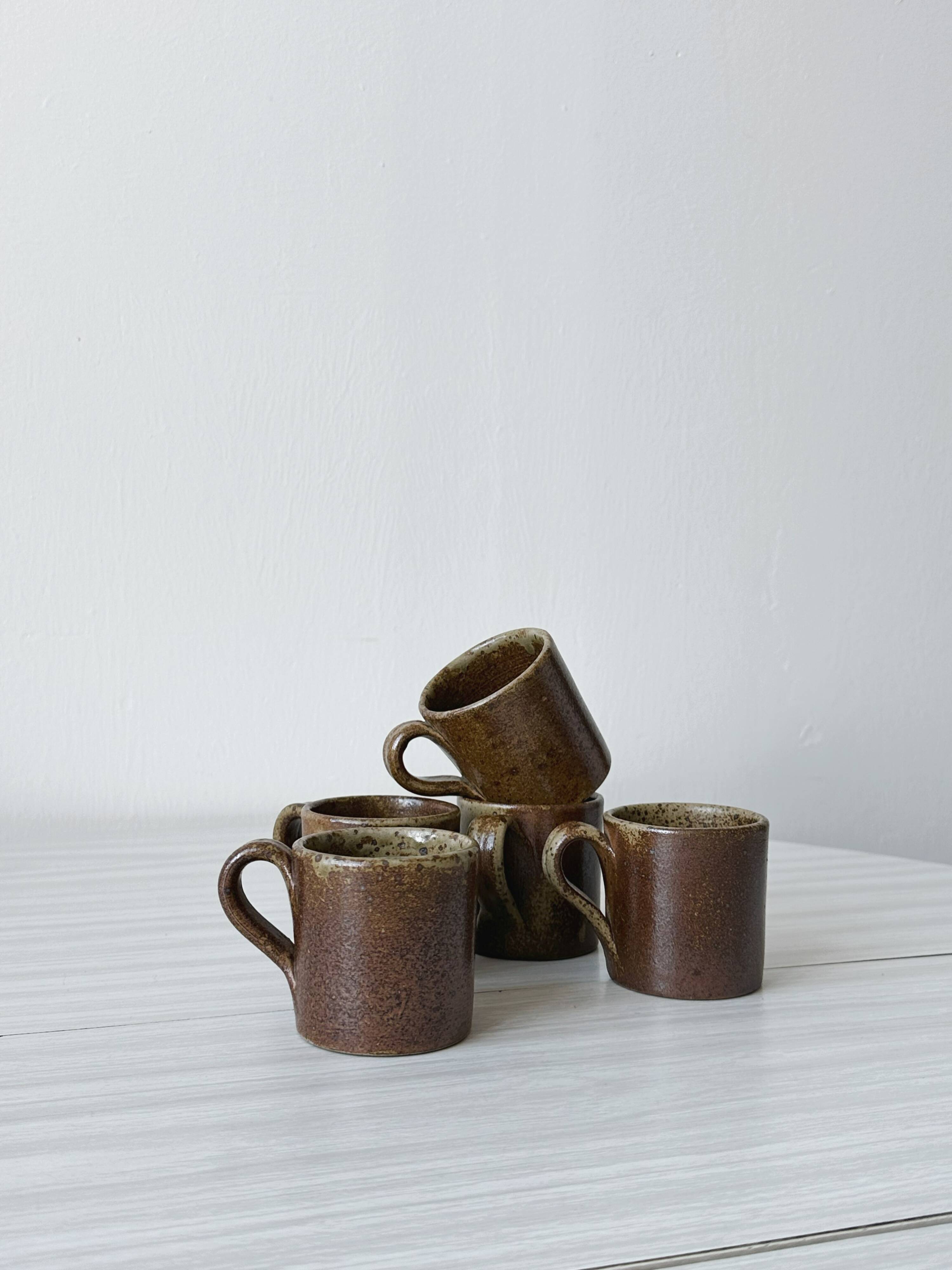 Artisanal pyrite-colored stoneware mugs