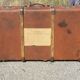 Old travel trunk made of wood and brass