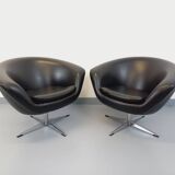 Pair of vintage Scandinavian swivel armchairs in faux leather and chrome.
