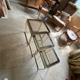 Brass nesting tables with smoked glass tops