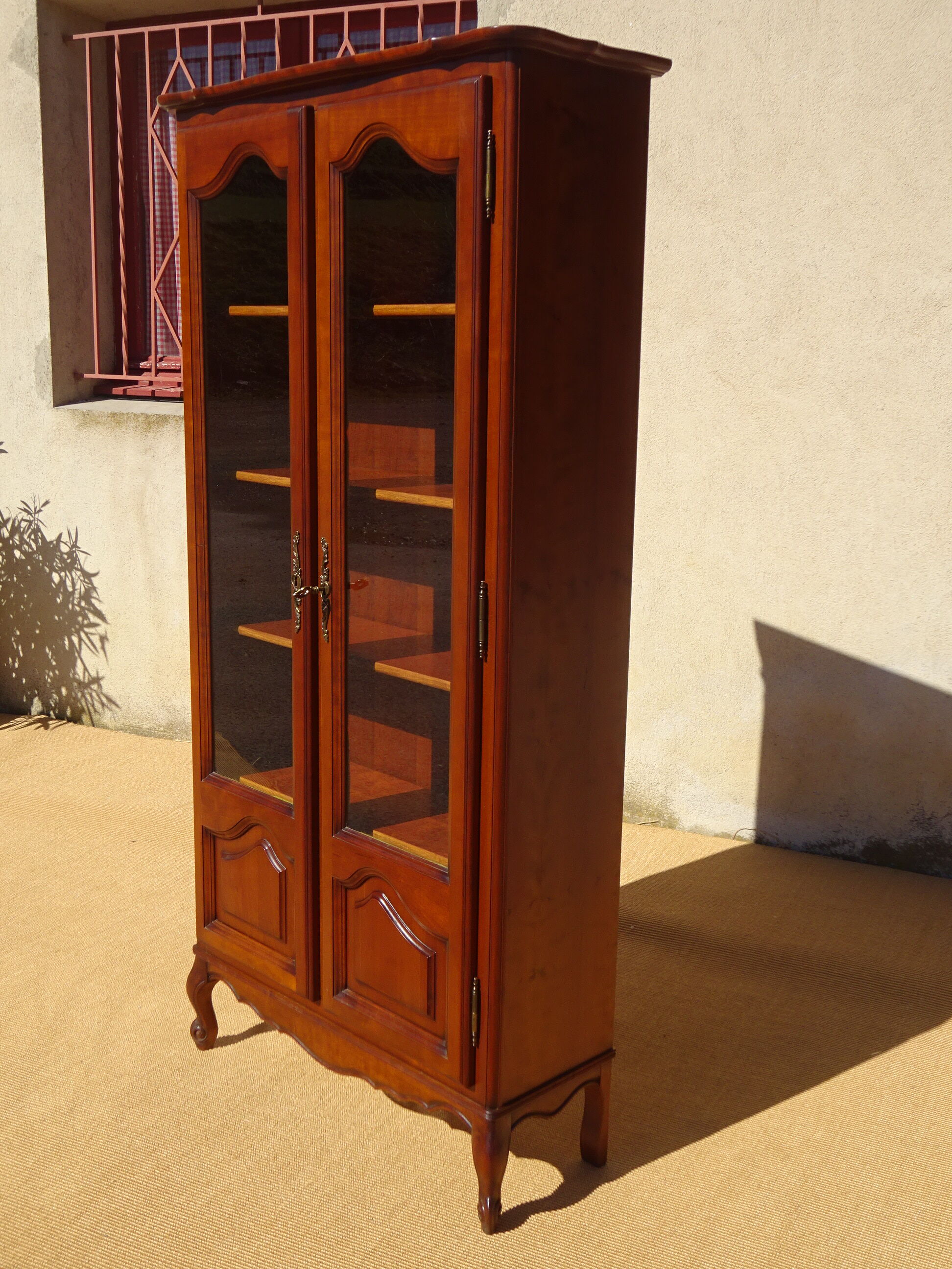 Shallow cherry wood showcase, Louis XV style