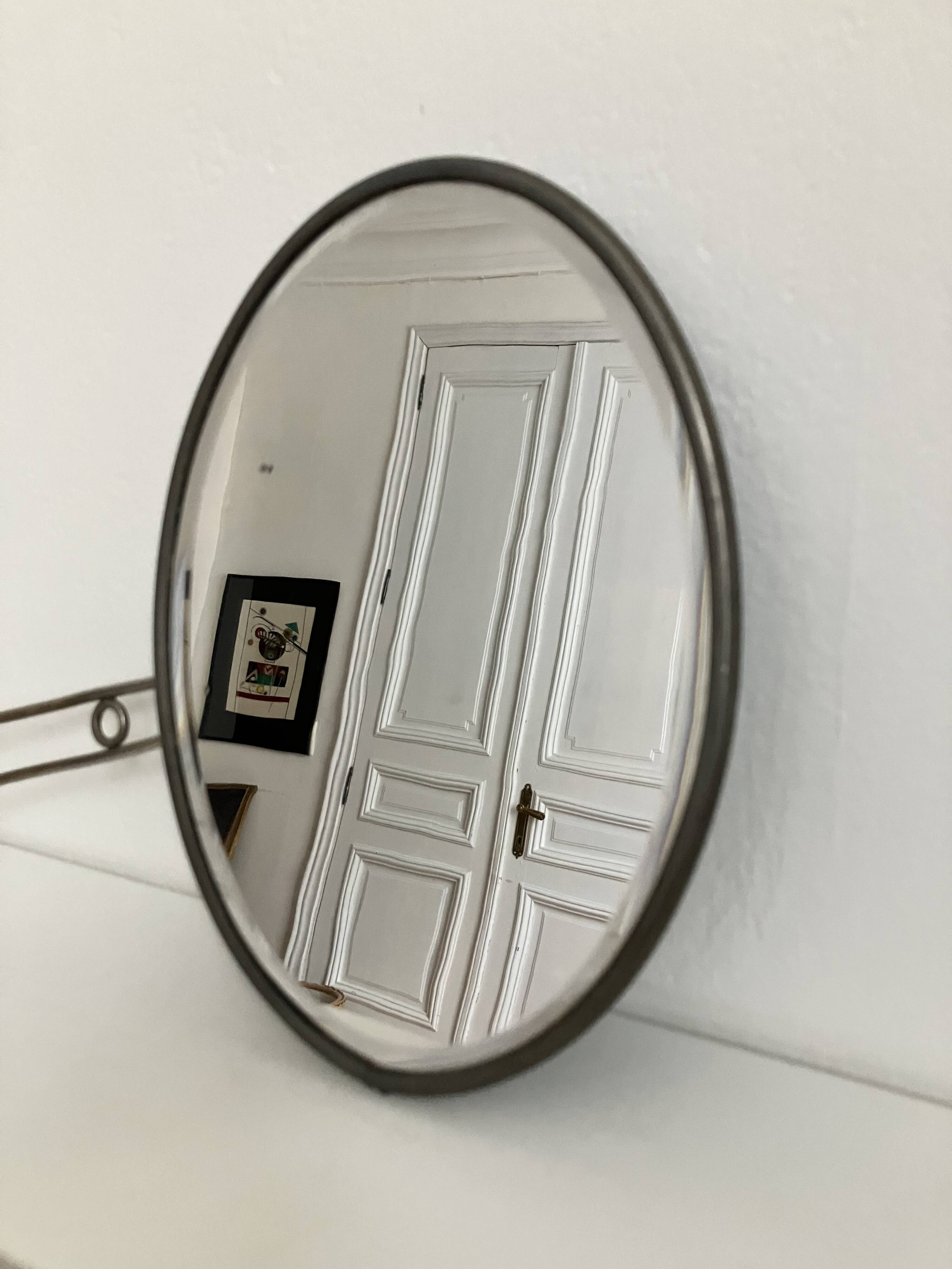 Early 20th century oval beveled mirror