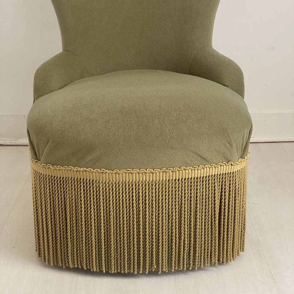 Small green velvet tub chair