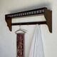 Antique wooden wall shelf with a turned gallery and 5 hooks L120 H40 D18
