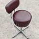 Set of 4 Mid Century Modern swivel chairs in tubular steel and leather.