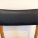 Scandinavian chair in beech and imitation leather black / vintage 60s-70s