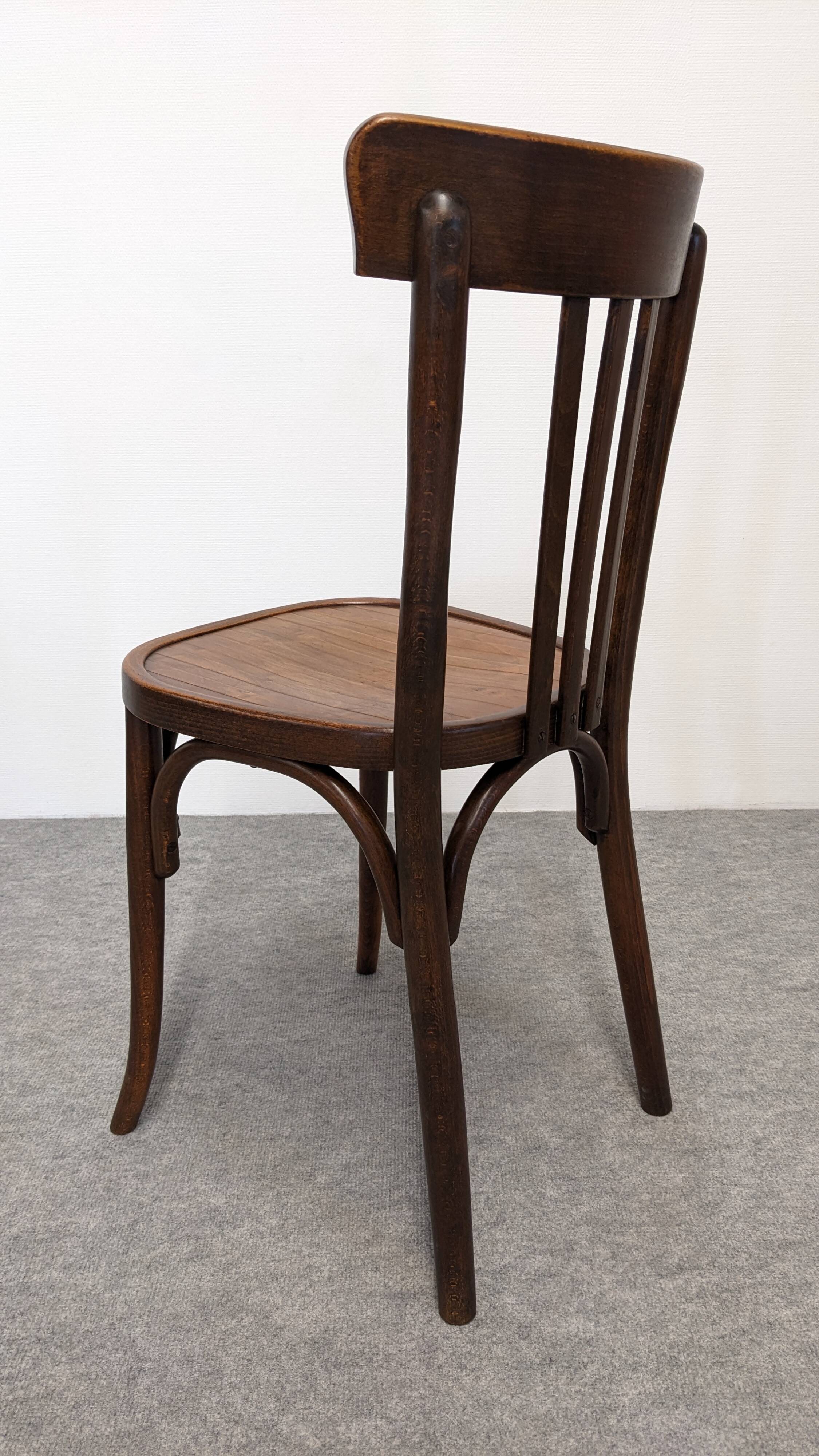 Set of 8 Baumann bistro chairs in bent beech, France circa 1930.