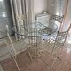 Wrought iron round table and 4 chairs