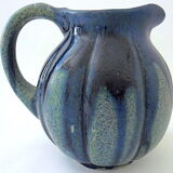 Pitcher in blue sandstone with blue drips, "melon" shape.