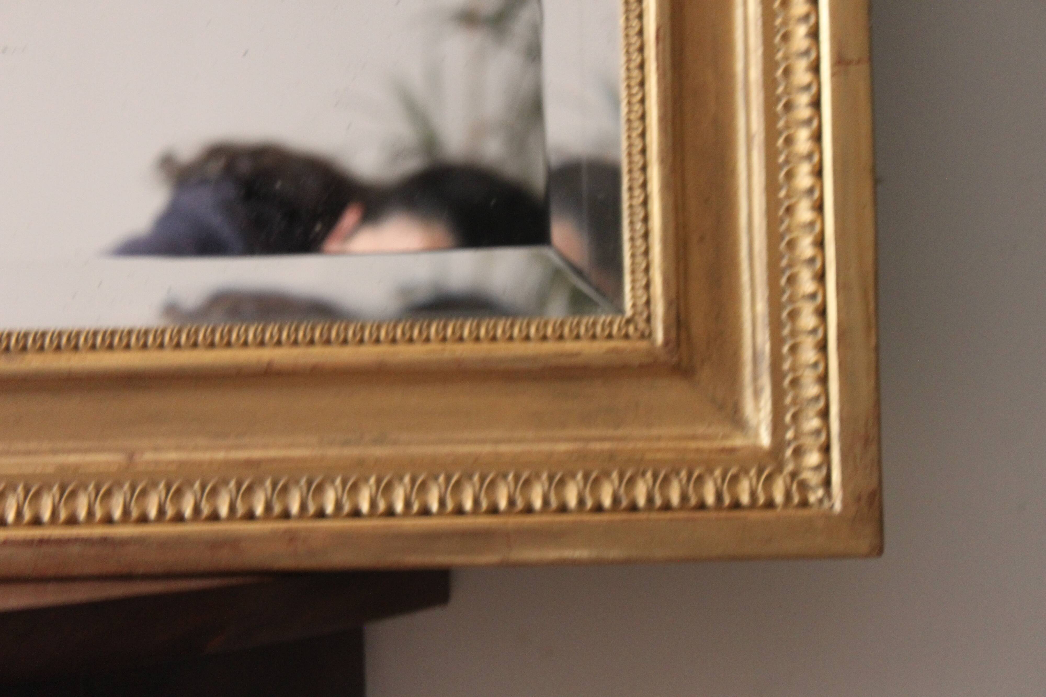 Large bevelled gold mirror