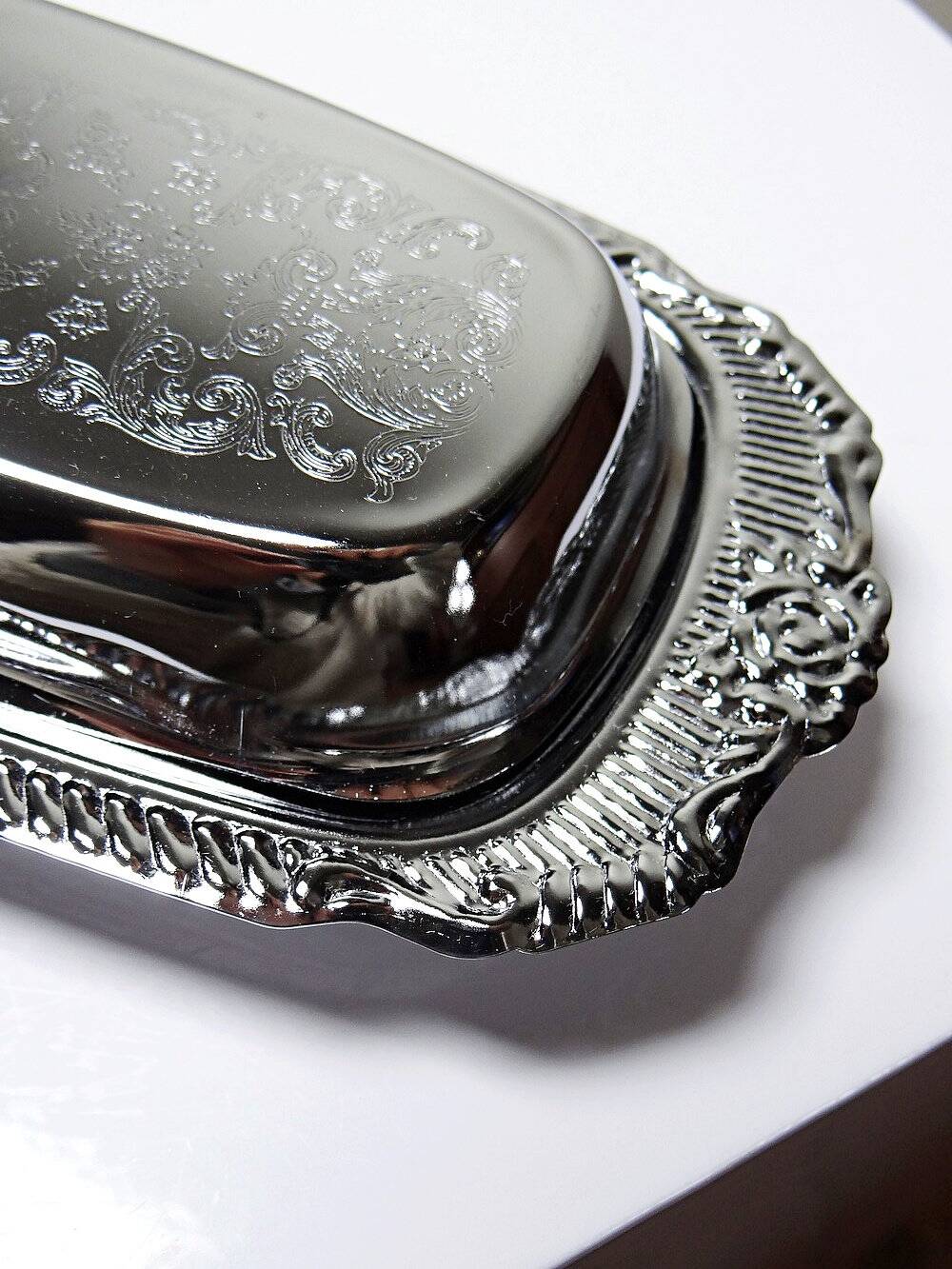 Silver-plated/inox vintage butter dish from the 1960s-1980s in Rococo style.