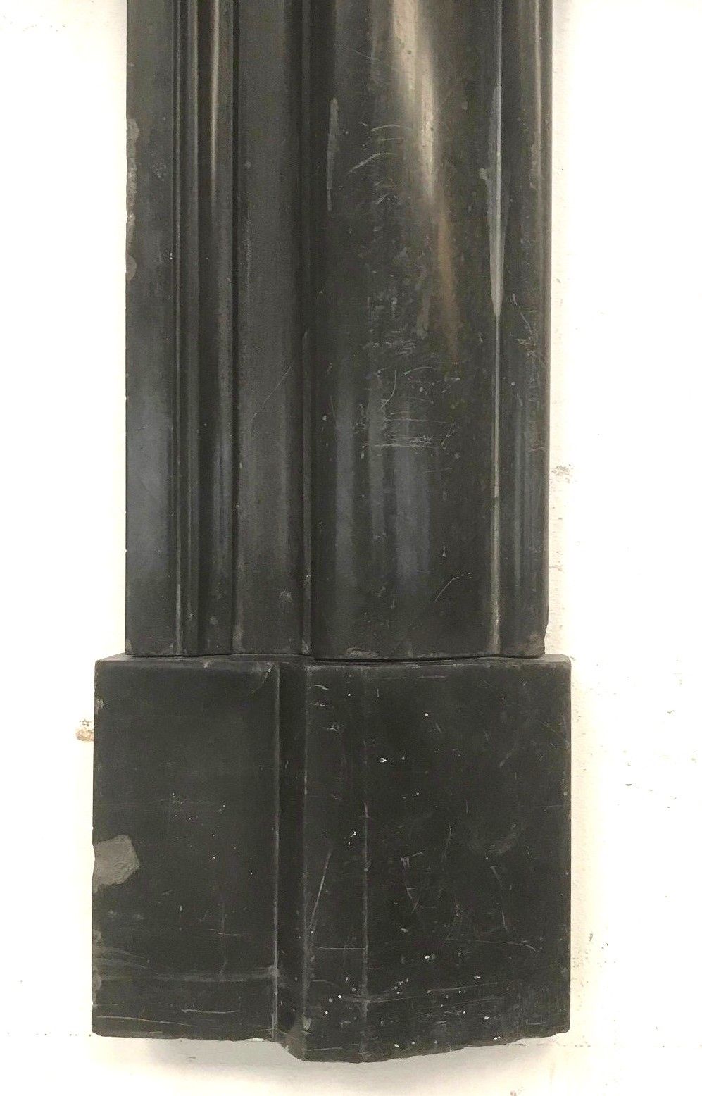 Old fireplace in black marble Louis Philippe