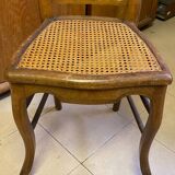 Antique wooden chair, cane seat