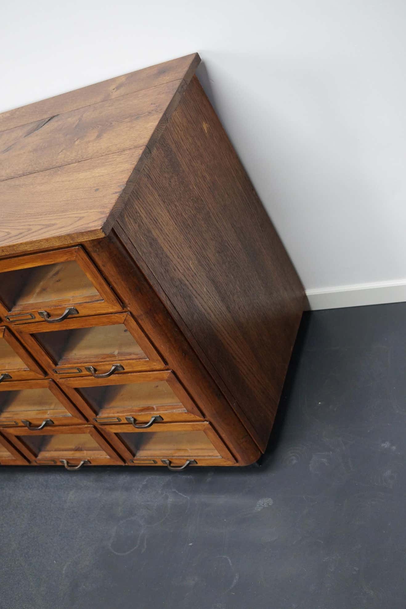 Vintage dutch oak haberdashery cabinet 1930s
