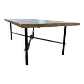 Coffee table in travertine with a wrought iron base.