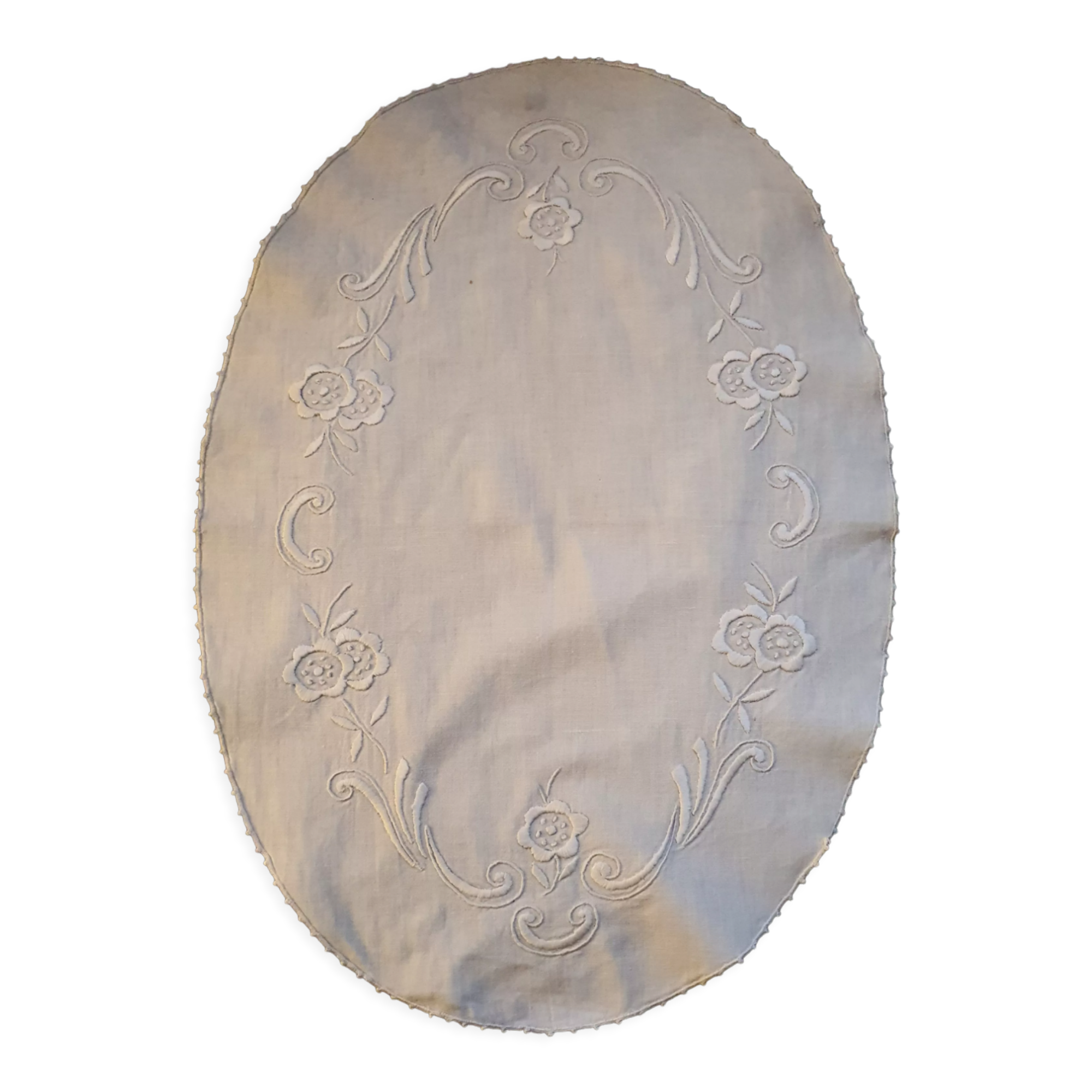 Hand-embroidered oval placemat