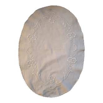 Hand-embroidered oval placemat