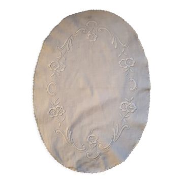 Hand-embroidered oval placemat